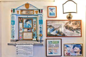 Altar of Diego Maradona tribute to famous Napoli soccer player at Bar Nilo in historic quarter of Naples, Italy 