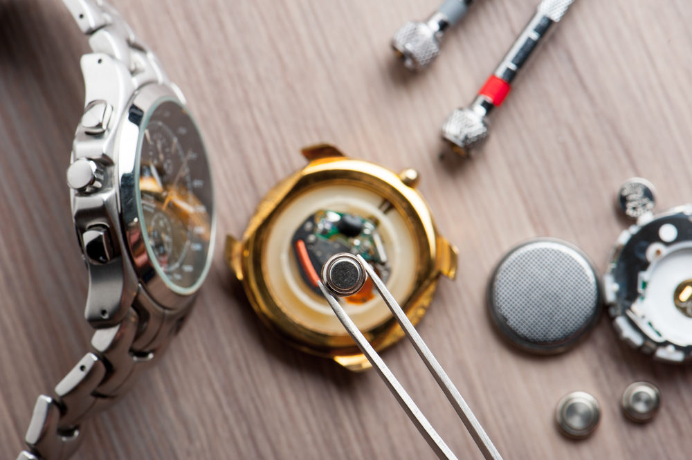 Replacing the batter of a luxury watch.