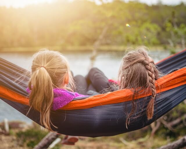 2 Girls in a hammock | Autism Levels and Applied Behavior Analysis