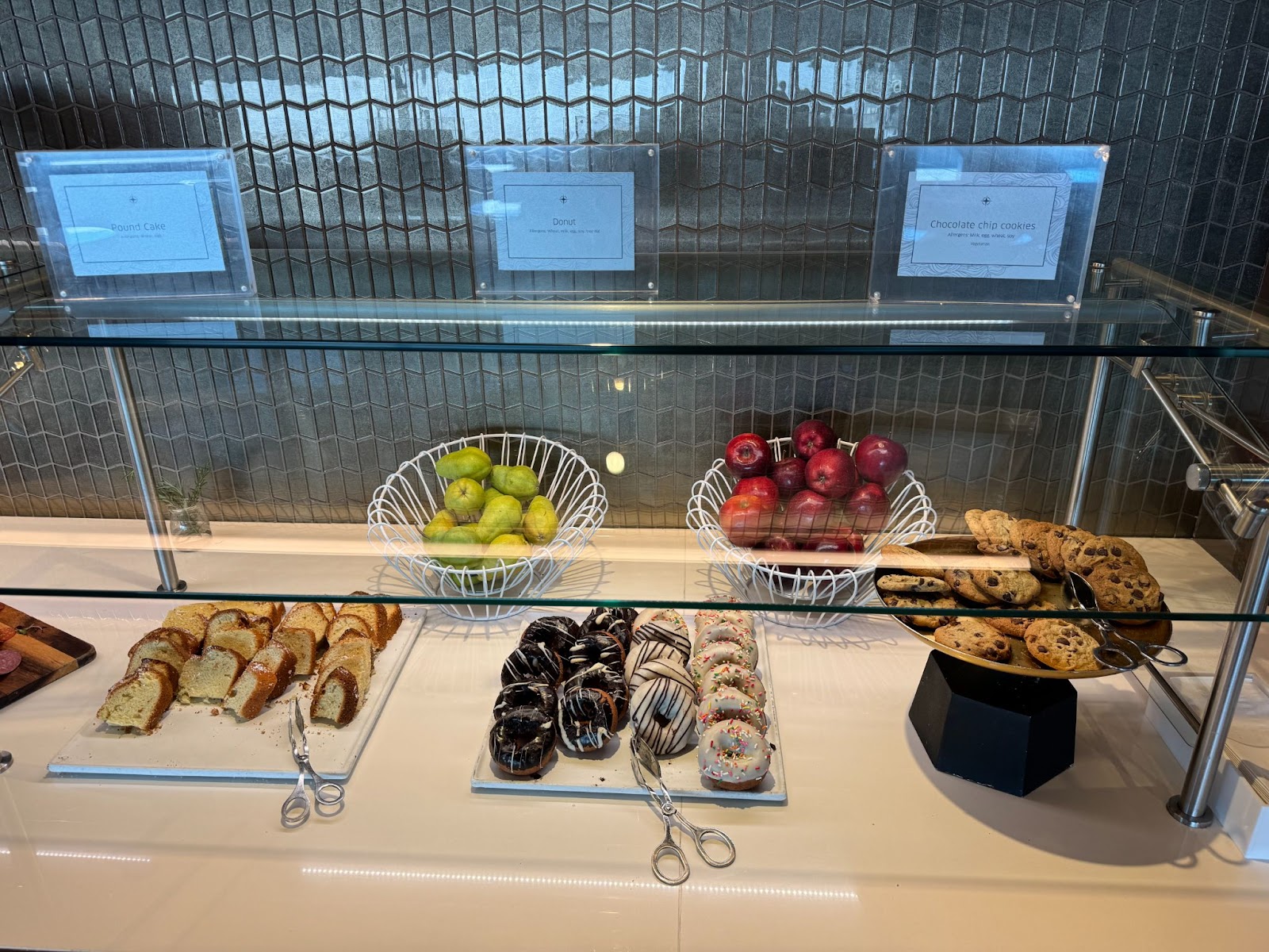 Pound cake, donuts, fruits, and cookies offered in the SFO Polaris lounge