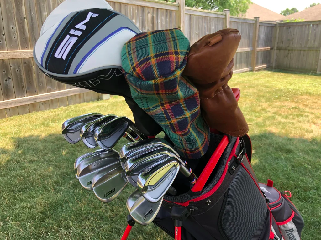 Bag of golf clubs in backyard