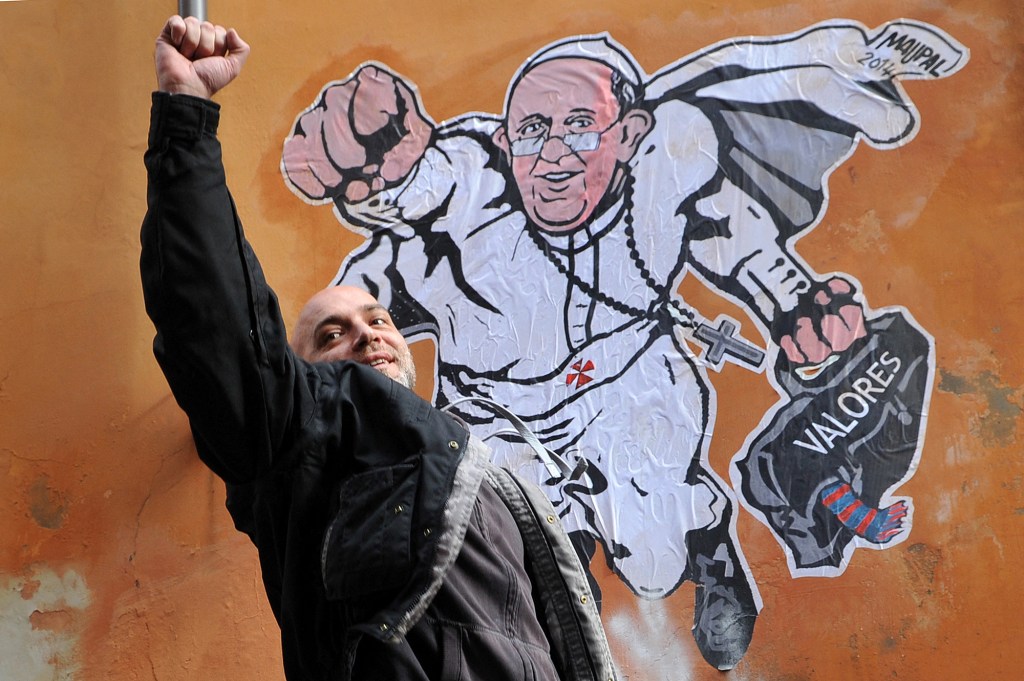 street-art-collage-by-Italian-artist-Maupal-showing-Pope-Francis-AFP