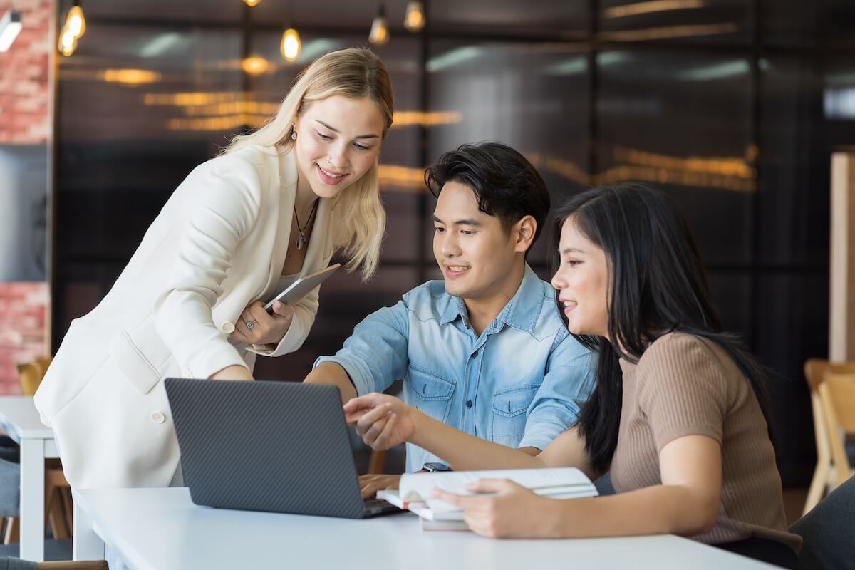 Behavioral health staffing: team looking at a laptop