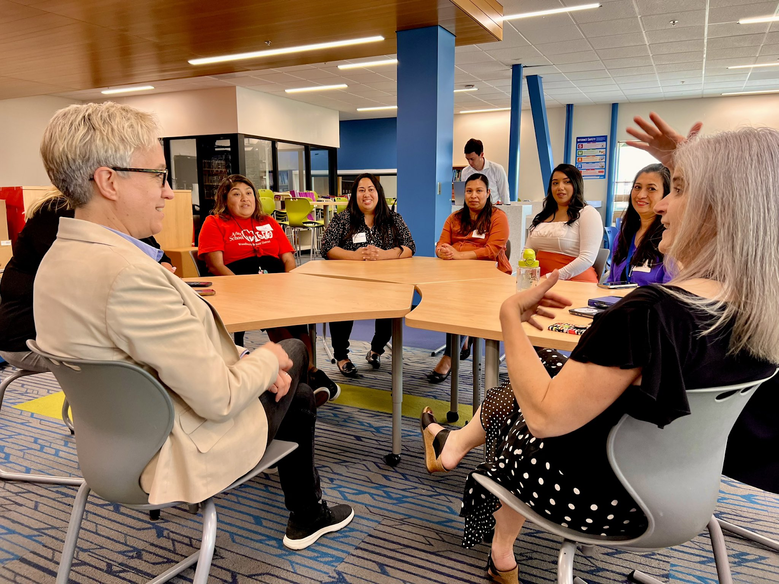 In Woodburn, Tina holds a roundtable with educators to learn more about their summer programs and discussing how to implement them statewide.