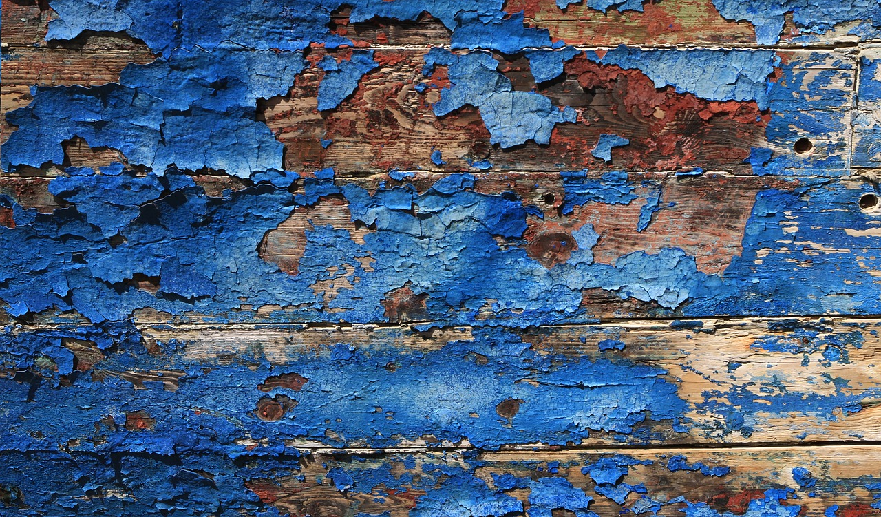 Paint peeling from wood surface
