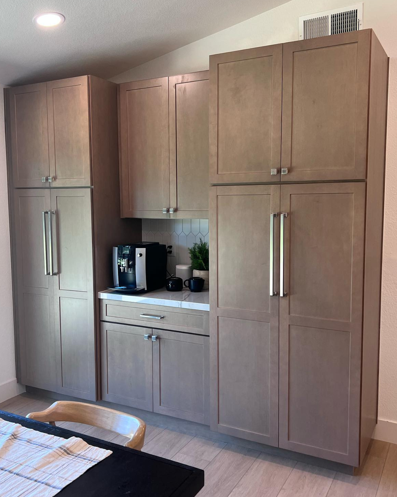 Cabinets with silver hardware finishes