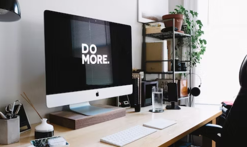 Desk with Apple Mac.