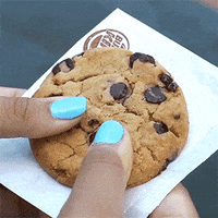Gif of A Cookie Being Broken Into Two