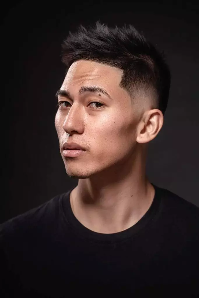 Side view of a guy rocking the spiky top with faded sides