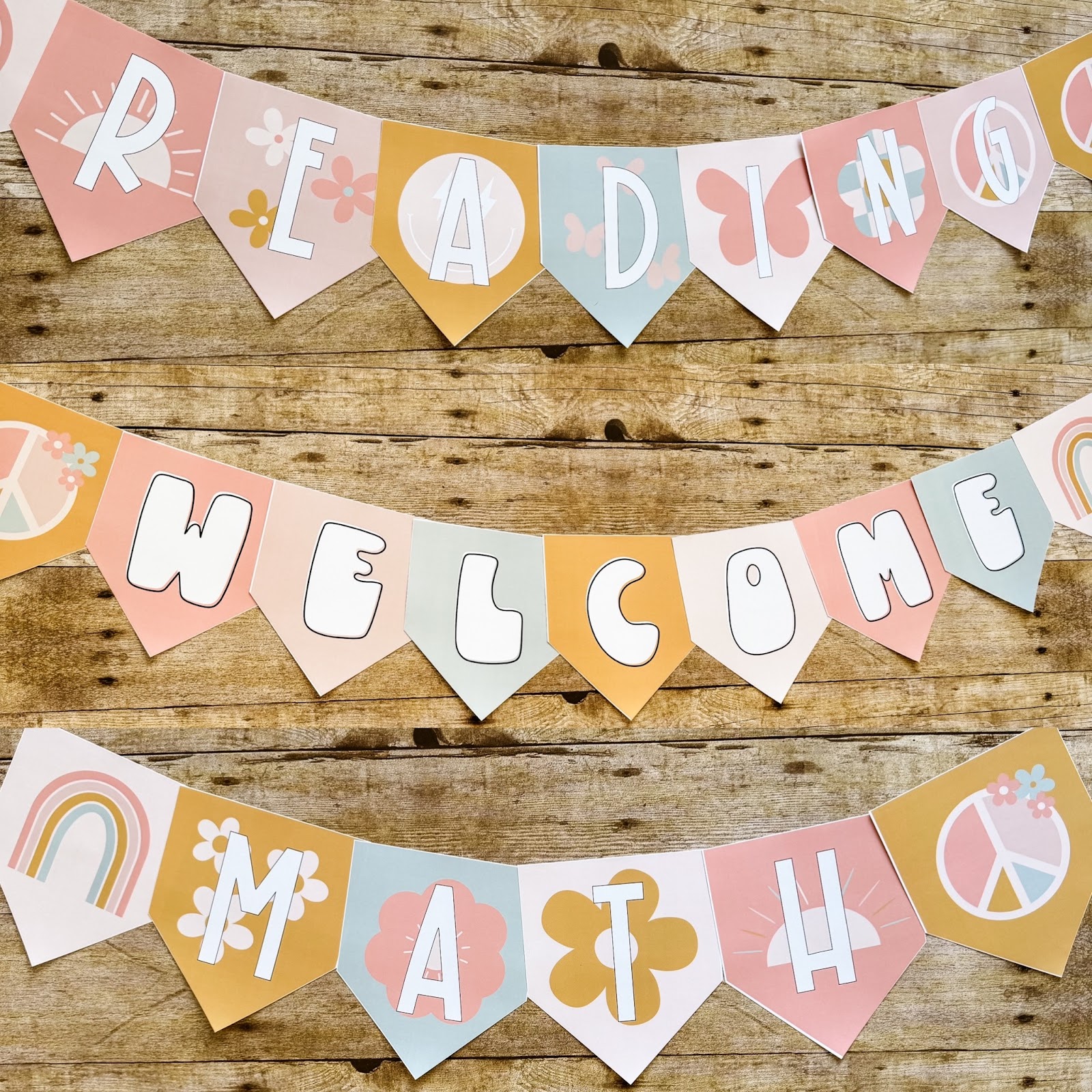 This image shows three different bulletin board banners that read, "Reading", "Welcome", and "Math". 