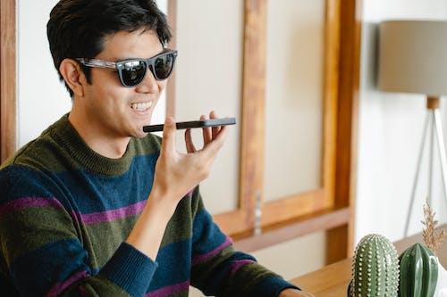 Free Photo of Man in Casual Oufit Talking to the Phone Stock Photo