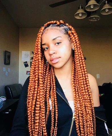 Picture of a lady wearing the Ginger Box Braids 