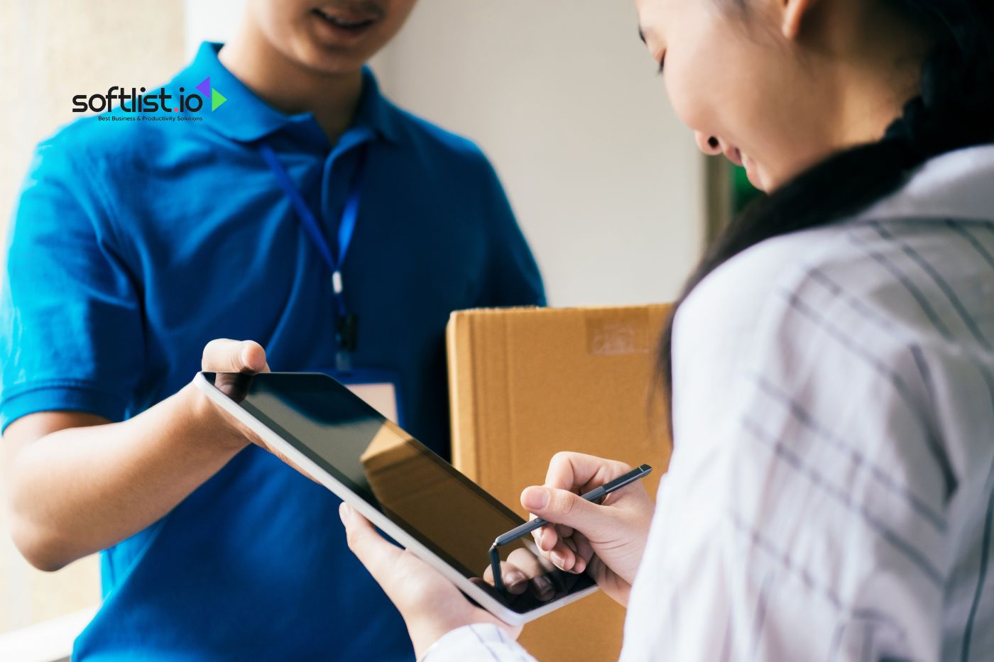 a girl receiving a package from delivery guy