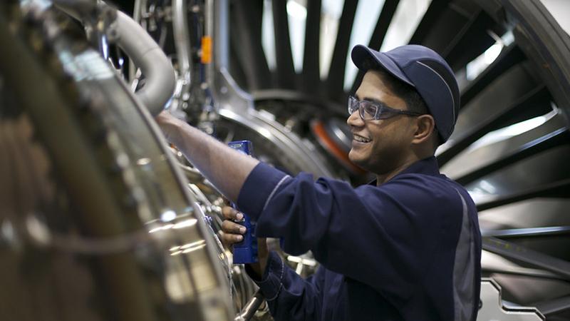 Engineer working on a component