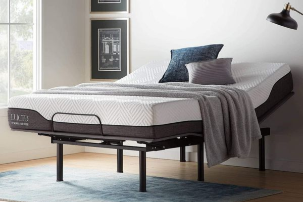 Adjustable bed frame with black steel legs.