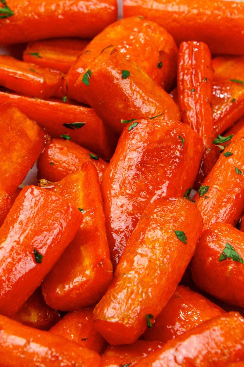 Air-fried carrots served on a white plate.