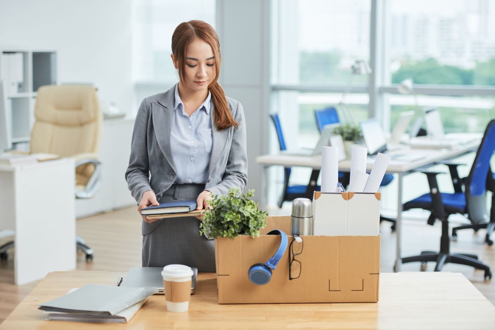 women unpacking her belongings on her first day of work
