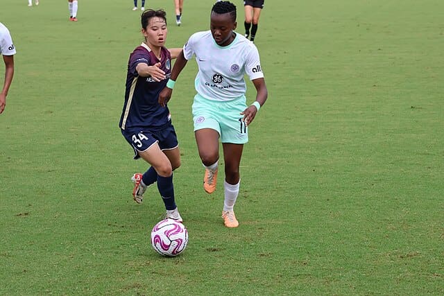 Thembi Kgatlana playing in a North Carolina Courage vs. Racing Louisville FC game in the 2023 NWSL Challenge Cup final