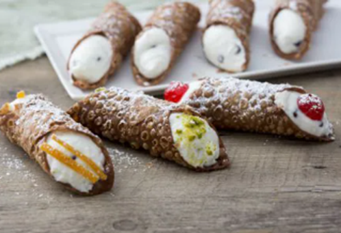 Cannoli: A Sicilian dessert consisting of tube-shaped shells filled with sweet ricotta cheese. The name "cannoli" means "little tubes" in Italian.