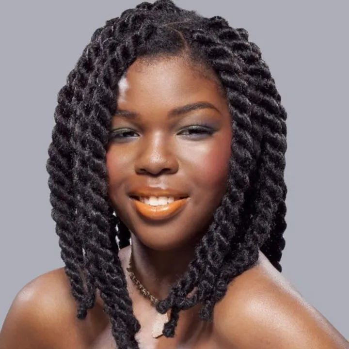 Picture showing a lady rocking a jumbo cuban twist hair