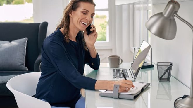 woman on the phone working from home