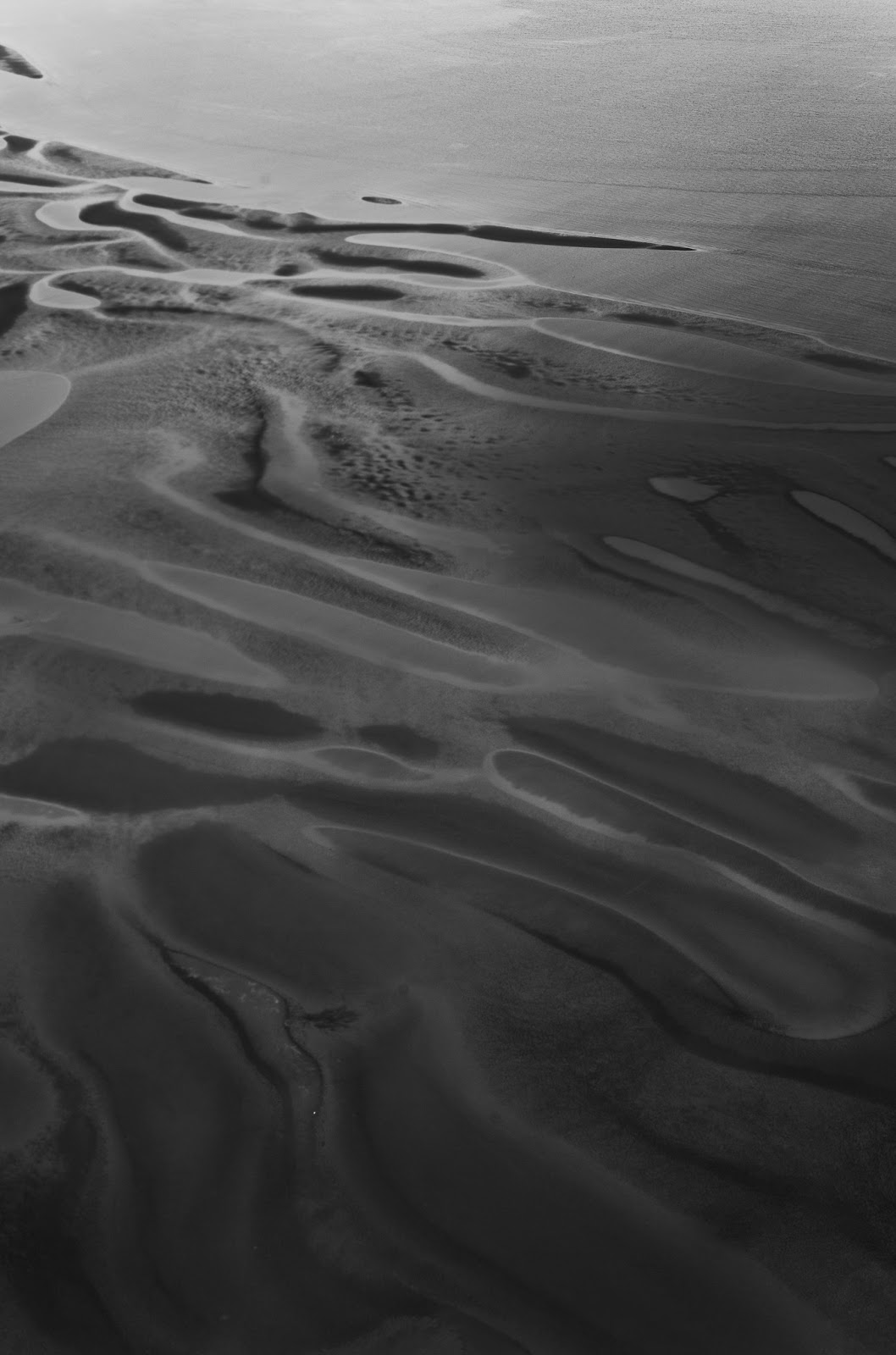 Black and white photo of desert sands.