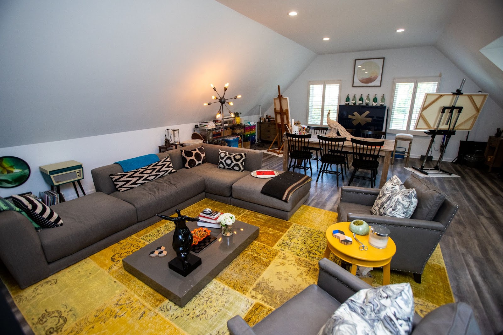 Spacious living space and artist's loft as part of a carriage house conversion in Oakton, VA.