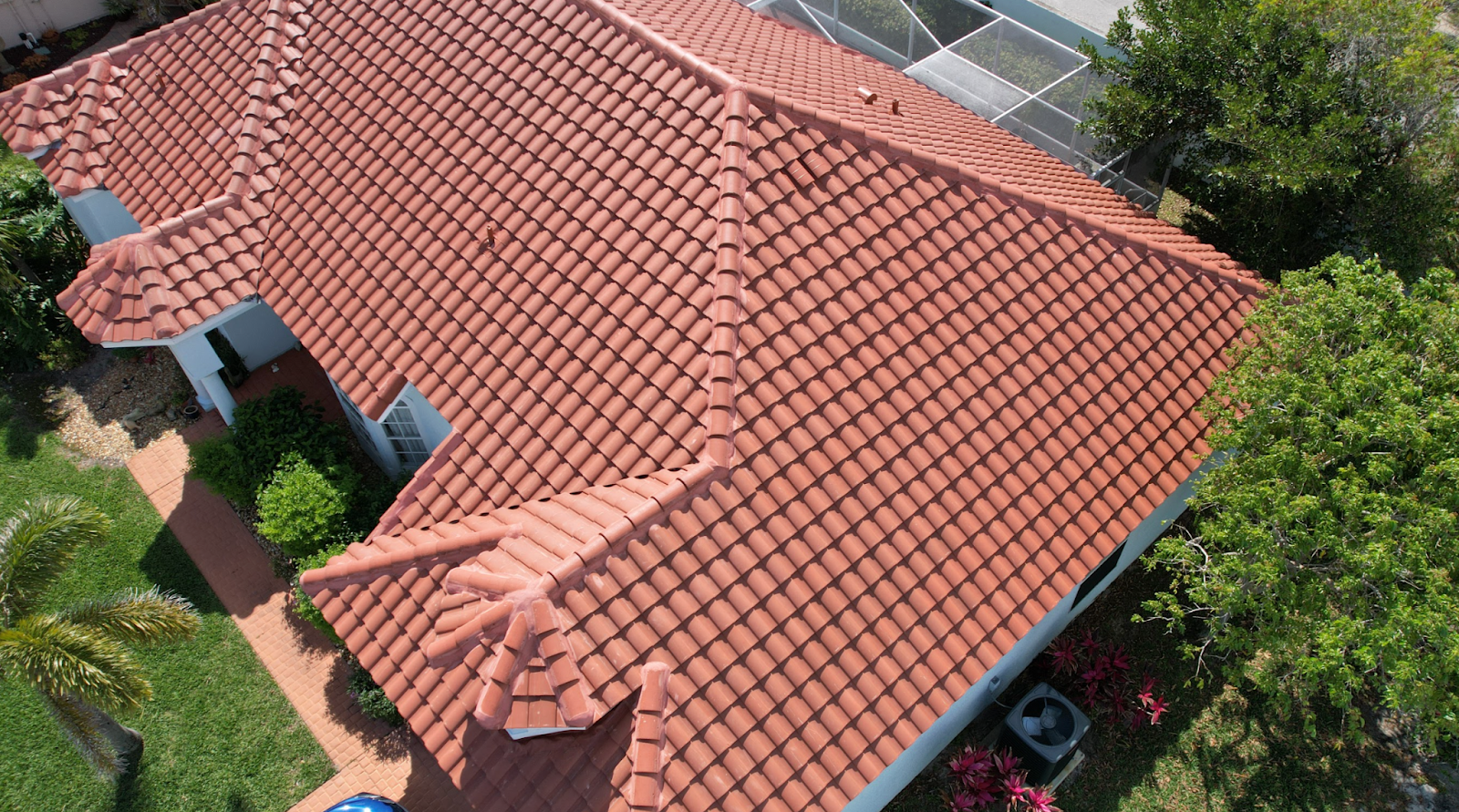 A bird's eye view of red roof tiles, showcasing Wescon Construction's expertise in roofing
