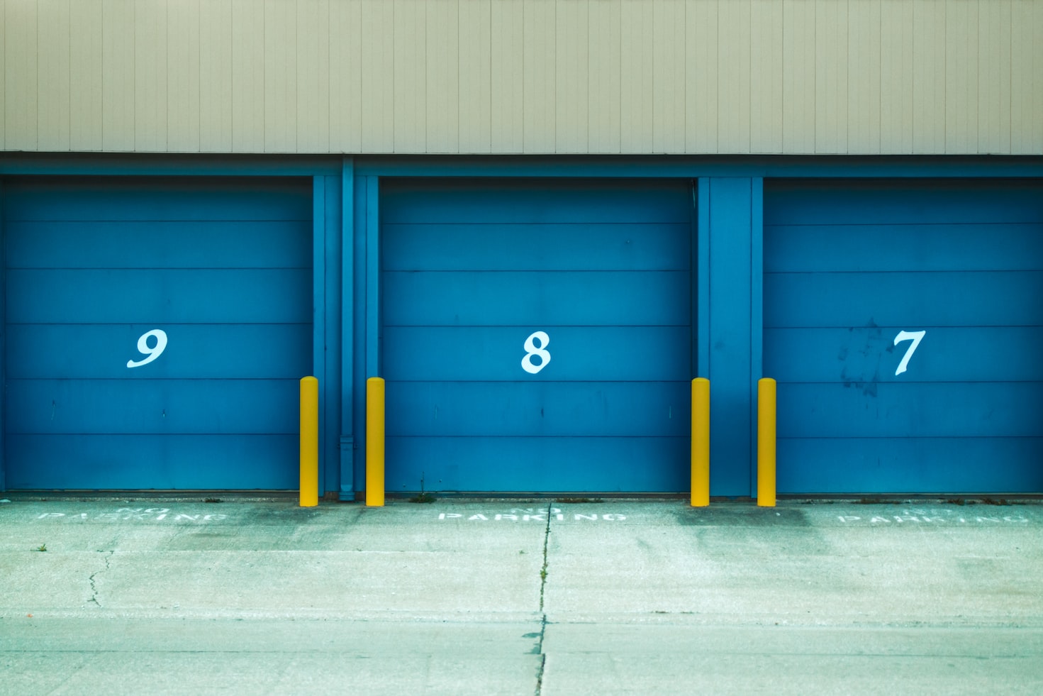 storage units with numbered blue doors