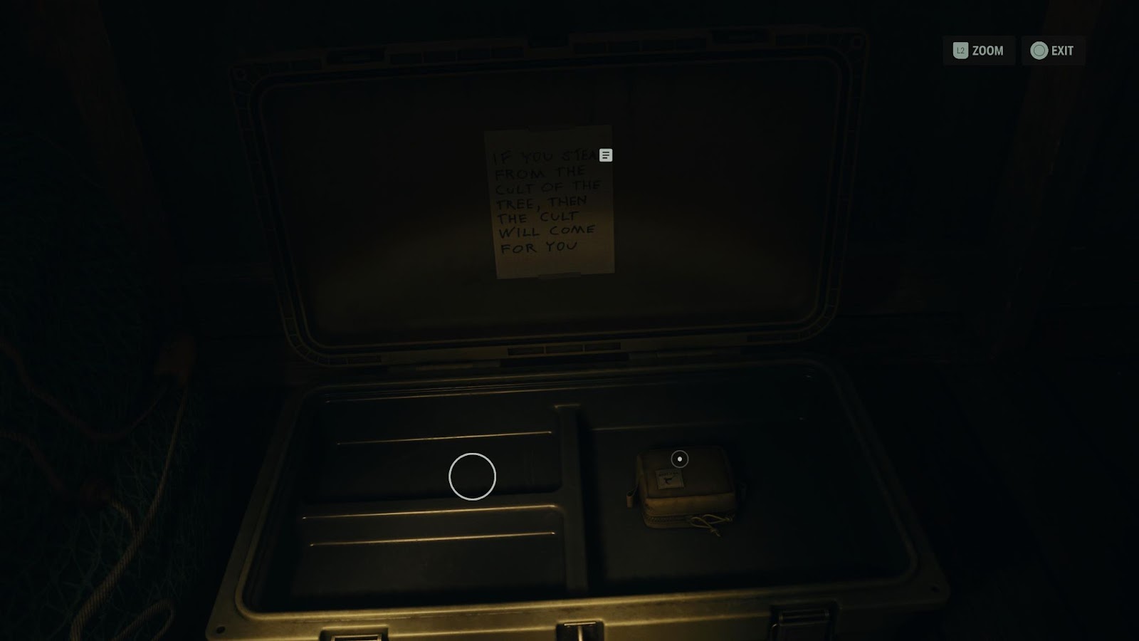 A screenshot from Alan Wake 2 showing a sticky note on the inside of a stash.