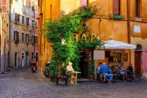 Piazza of Italian bar in old quarter of Trastevere, Rome