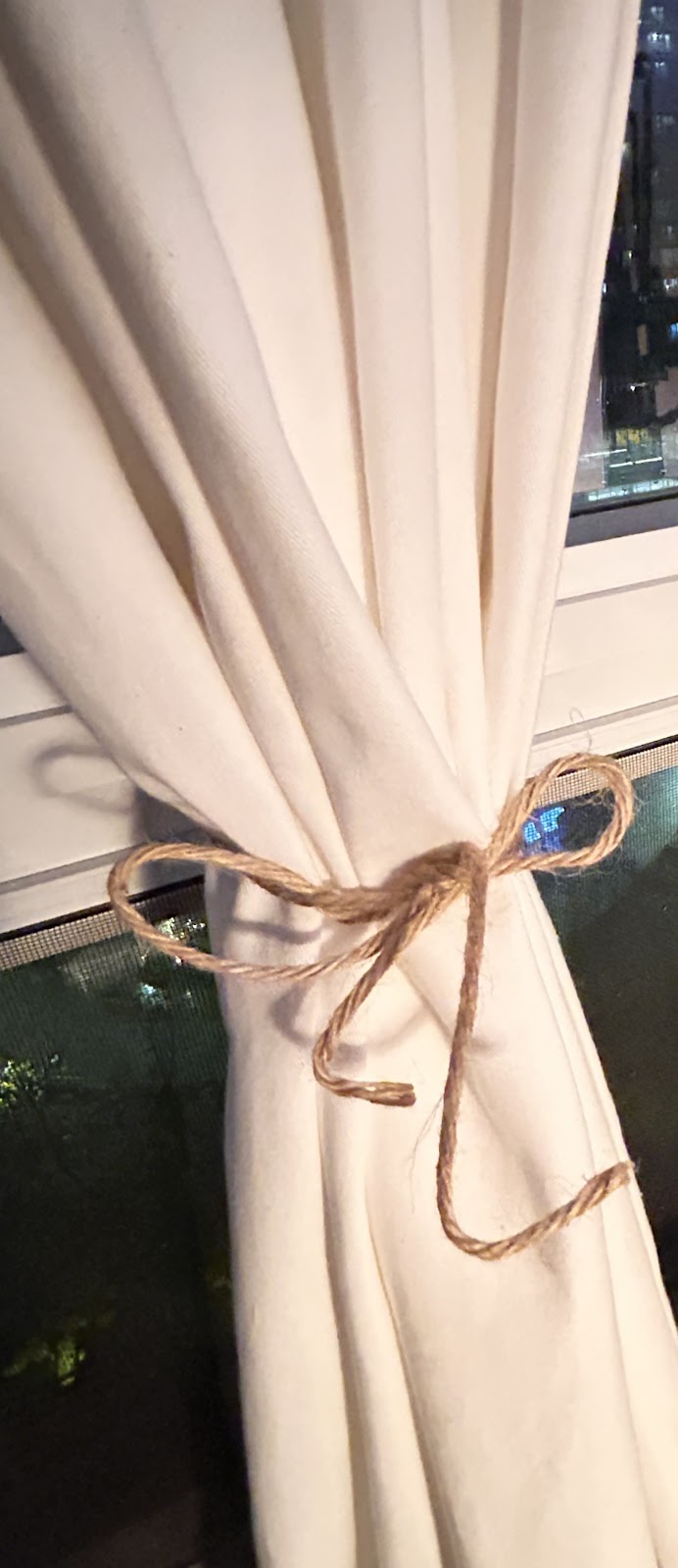 Budget-Friendly Twine Curtain Tie-Backs: Simple and charming curtain accessories made with economical twine, adding a rustic touch to home decor.