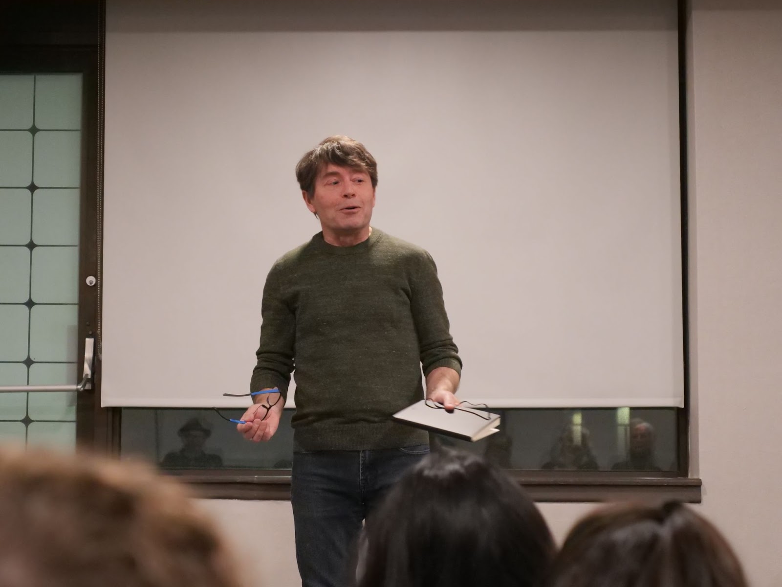 Michael Crummey speaks candidly to the students before reading one of his poems. 