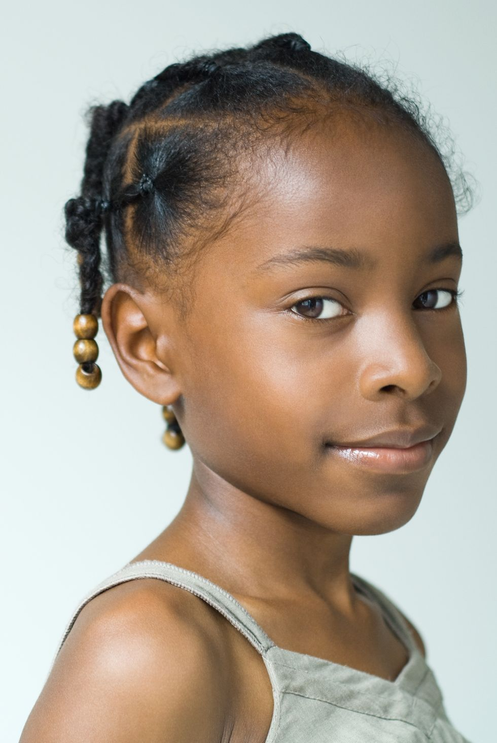 Picture of a girl rocking the braids with beads