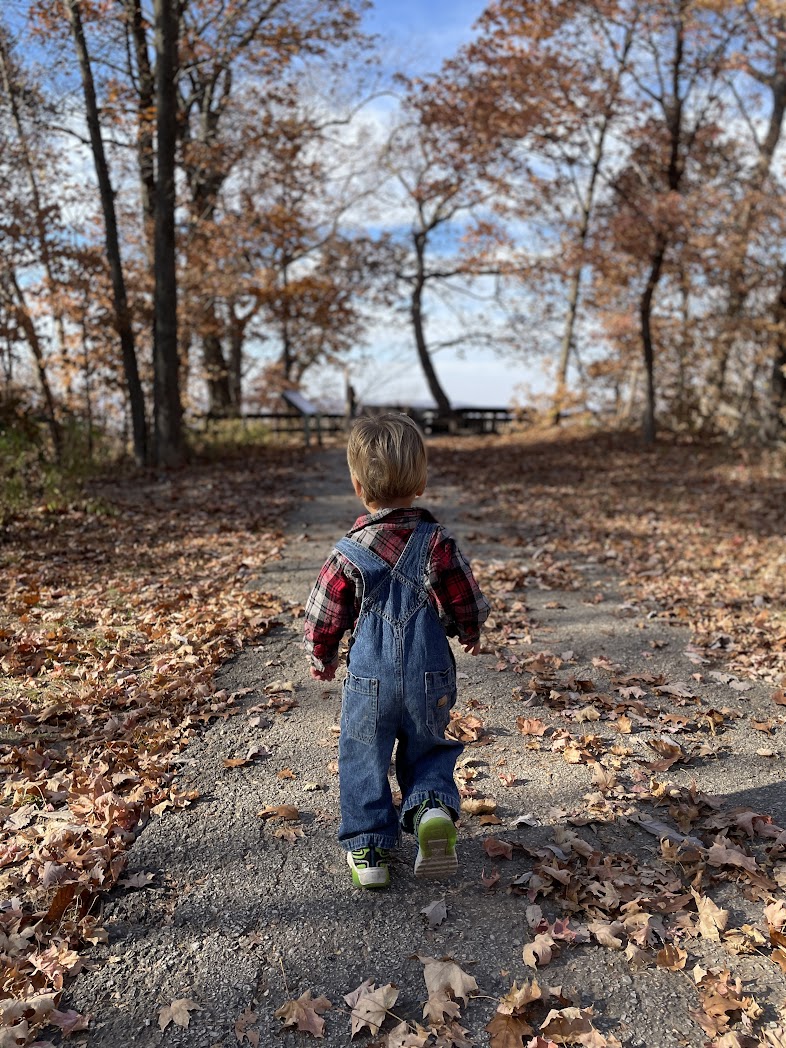 A boy walking toward the overlook at Weston Bend State Park