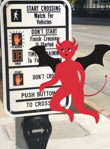 A red devil with wings and wings on a crosswalk sign

Description automatically generated