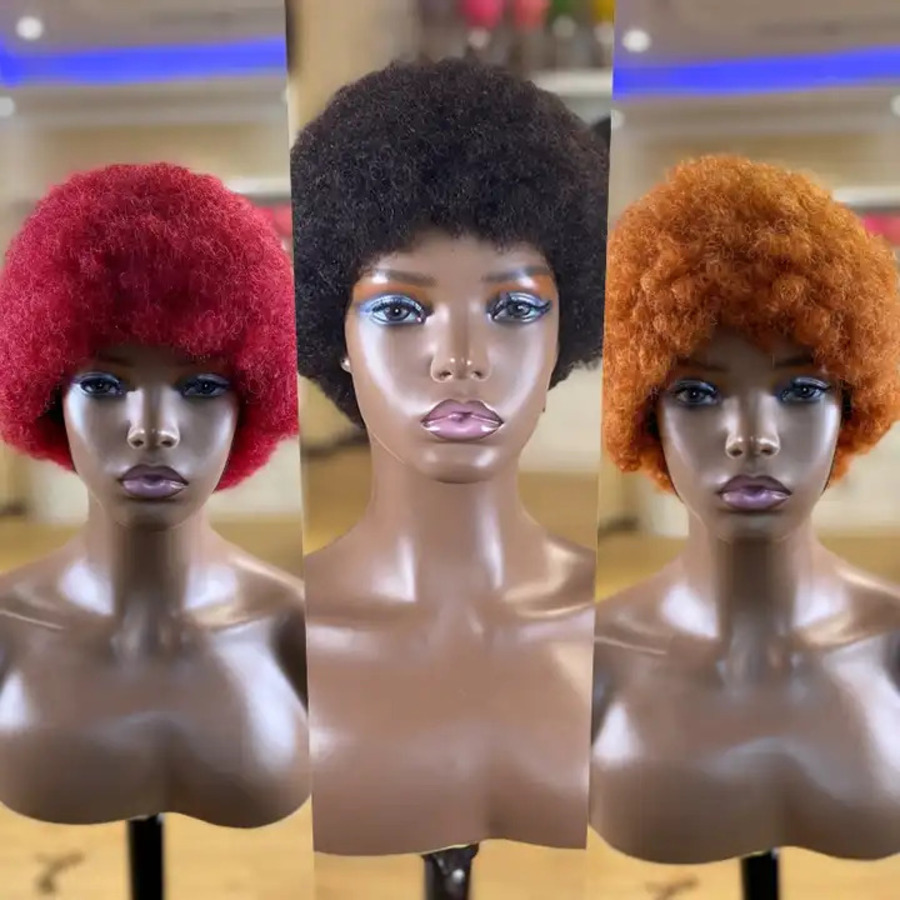Female mannequin heads with Afro hair wigs in various colors