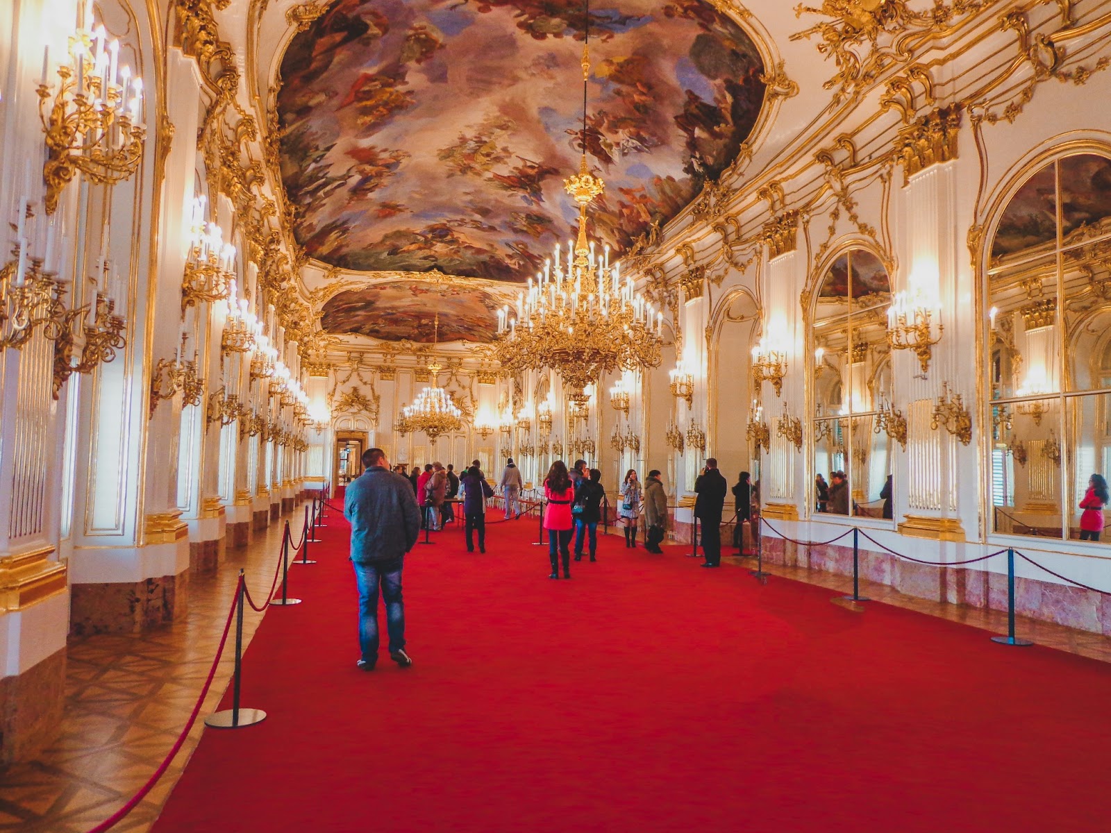 Intricate details adorn the opulent interiors of Schönbrunn Palace's Imperial Apartments.