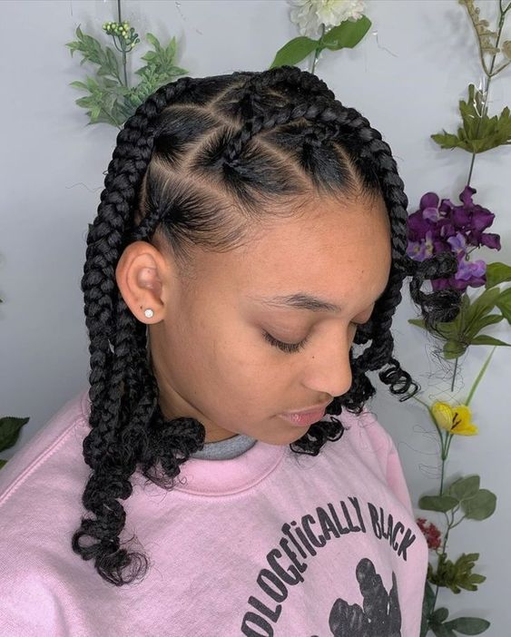 Picture of girl rocking box braids with curls 
