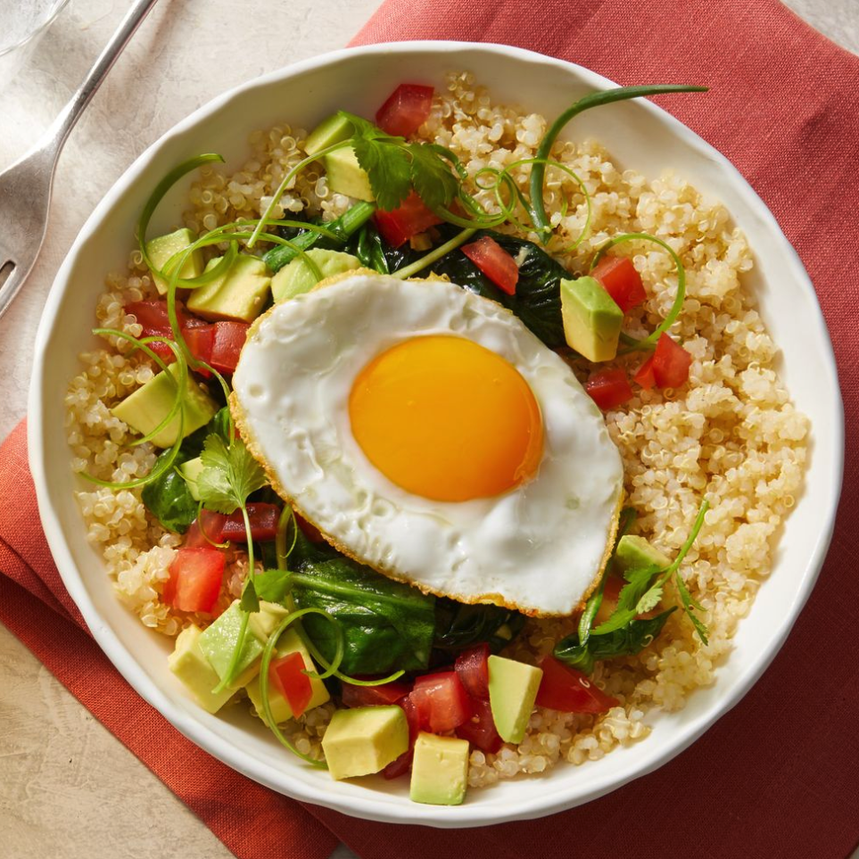 high protein breakfast grain bowl with sautéed spinach