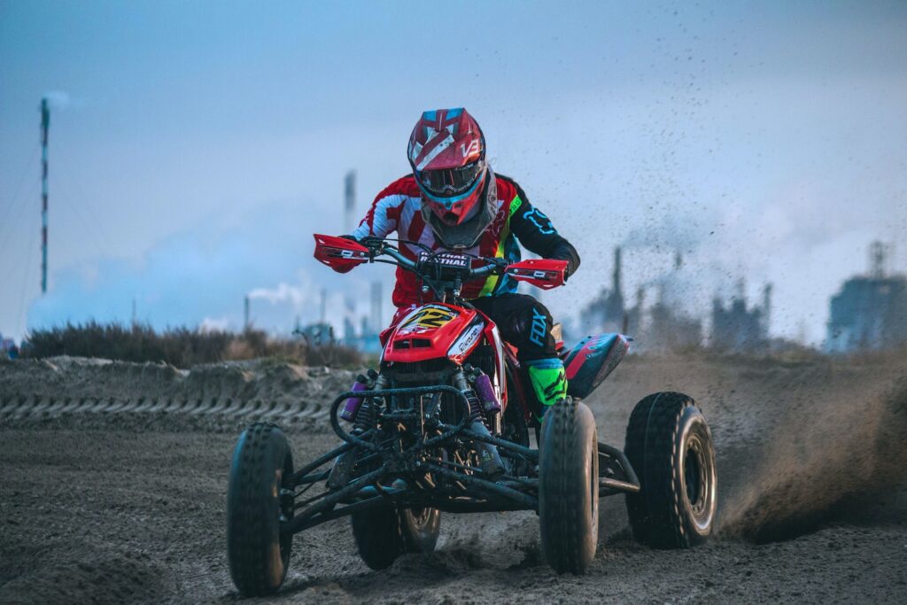 man riding all-terrain vehicle