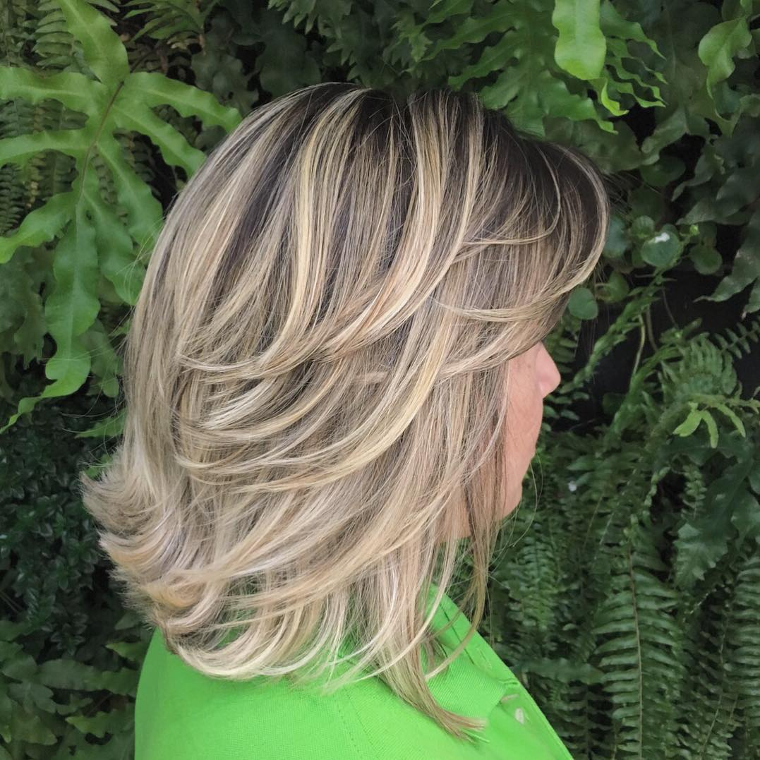 Shoulder-Length Hairstyle with Backswept Layers