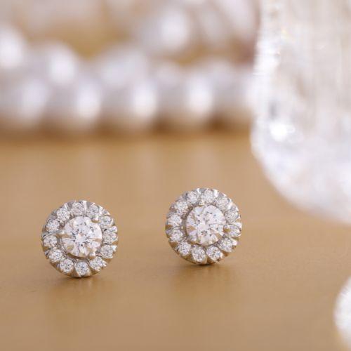 A pair of diamond earrings

Description automatically generated