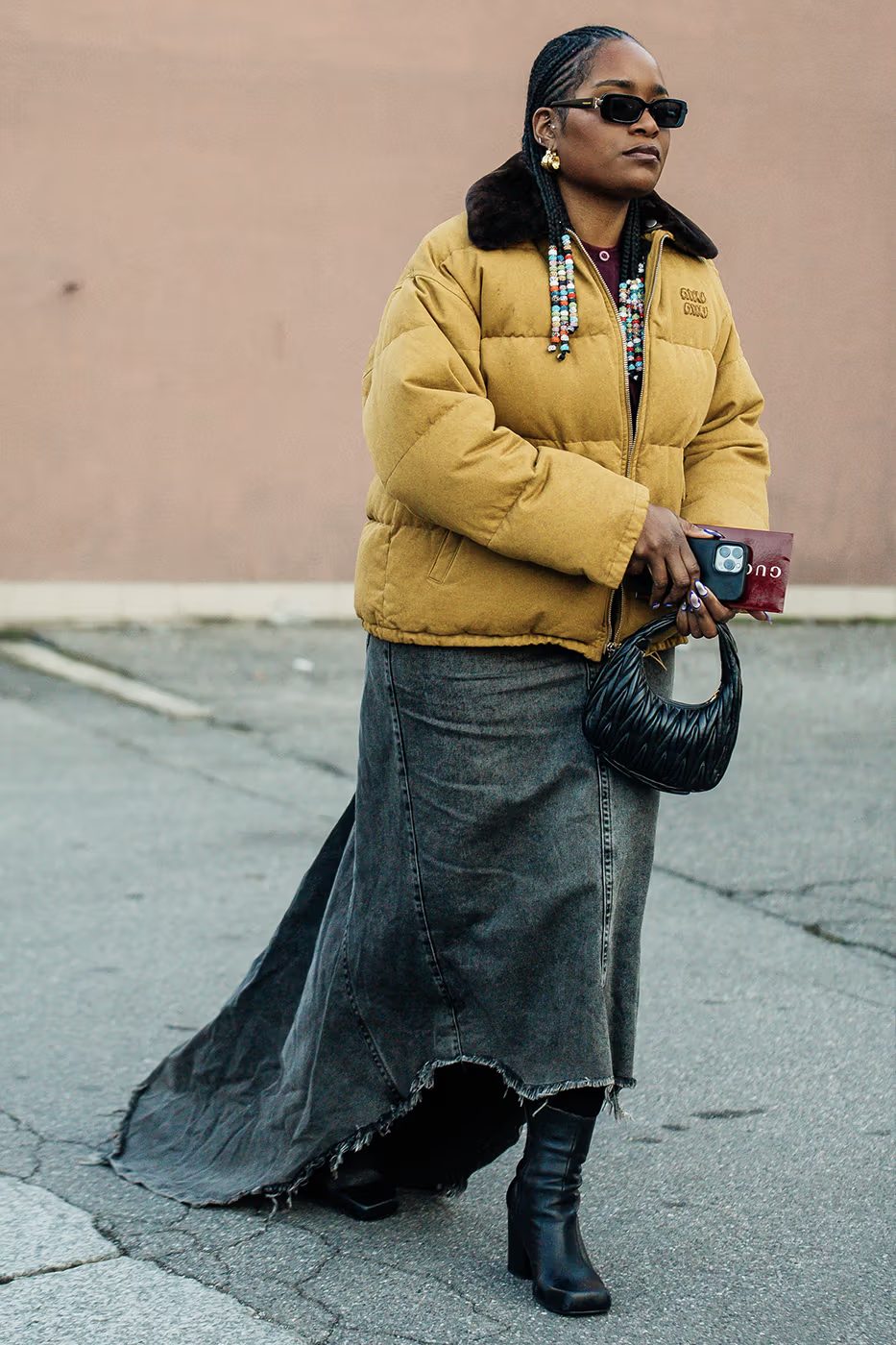 Picture showing an attendee dressed in a bomber jacket with glasses for the event