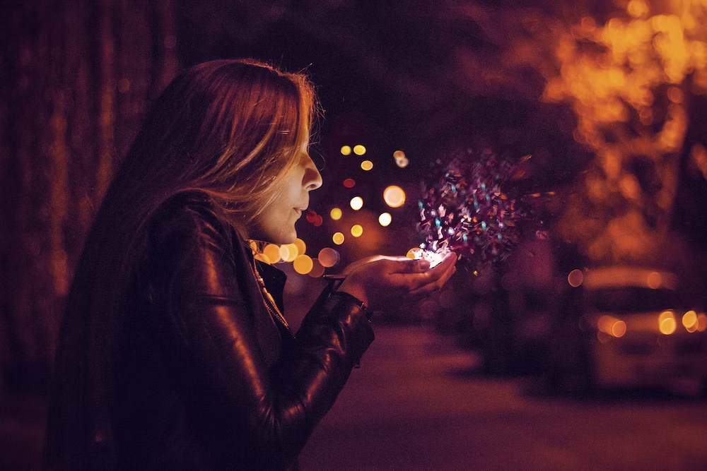 A Girl Sprinkling Cute Mini Lights in Night
