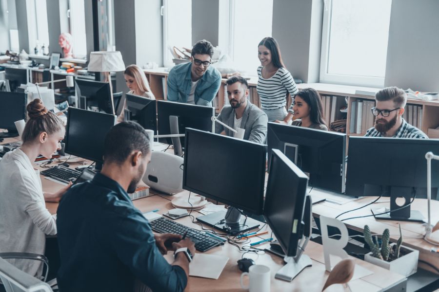 A group of people working at computers