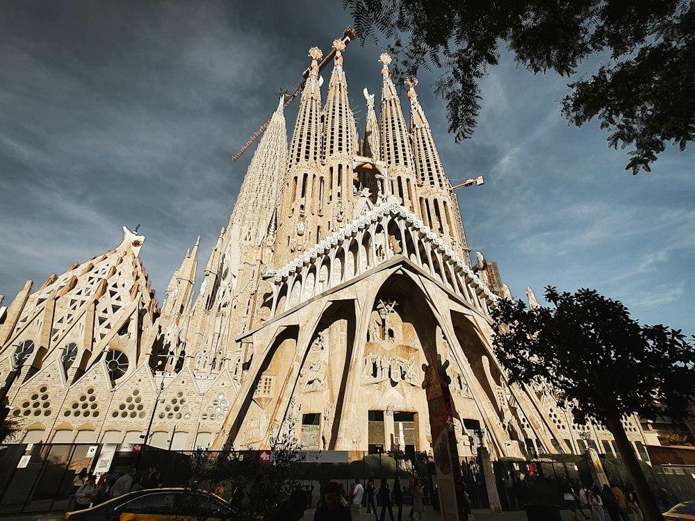 a very tall cathedral with a clock on it's side