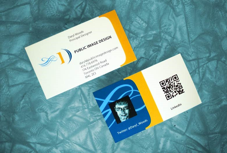 A business card with a QR code that leads to a LinkedIn profile.