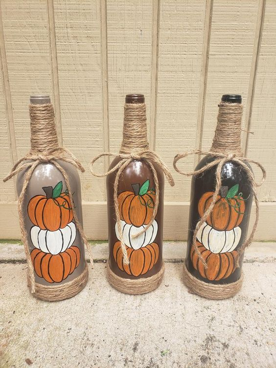 wine bottles are hand-spray painted