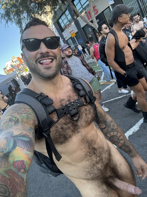 gay porn actor drew valentino showing off his hard and hairy naked body walking around with a fully erect cock at folsom street fair 2023